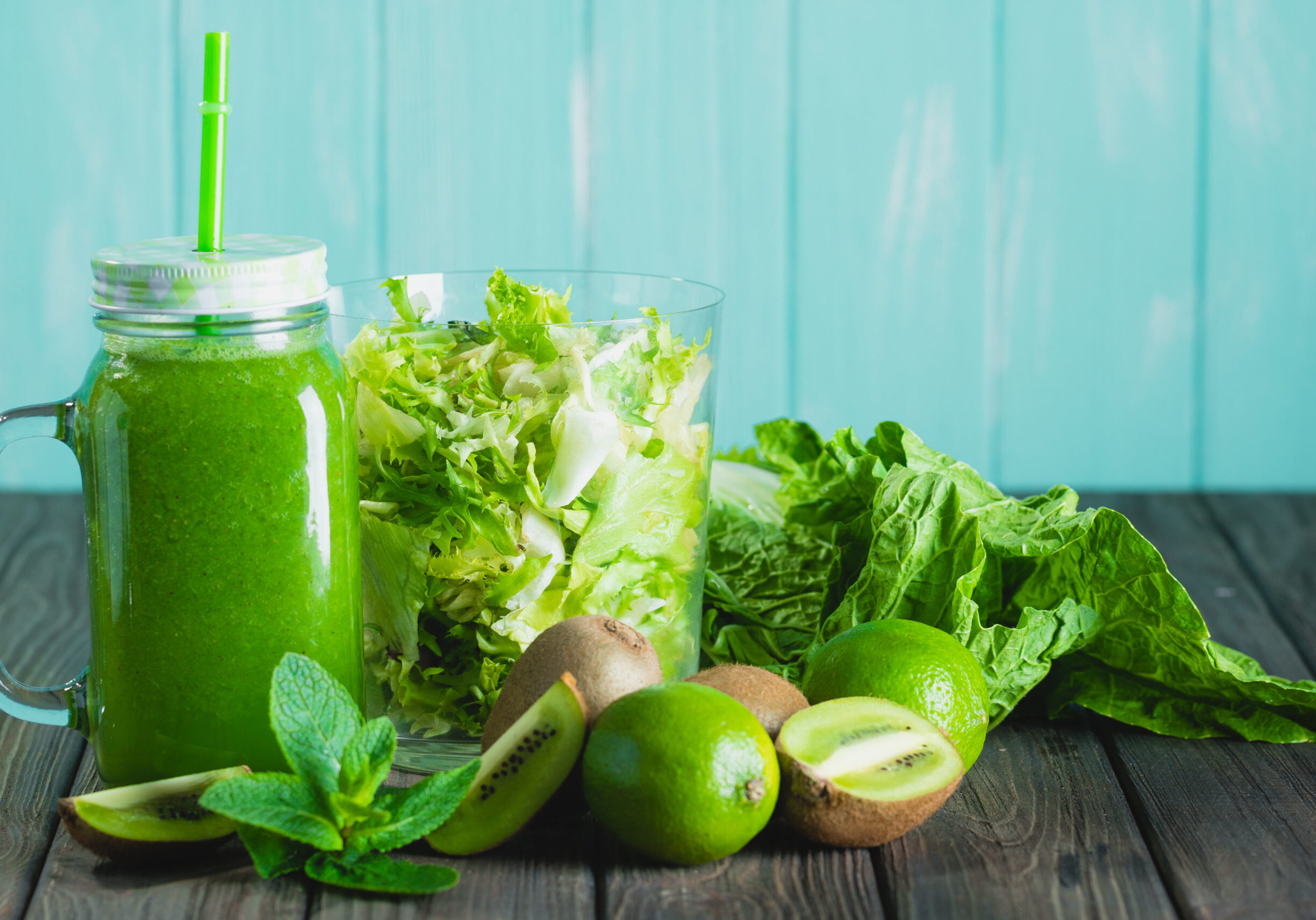 Blended,Green,Smoothie,With,Ingredients,On,Wooden,Table,Selective,Focus.