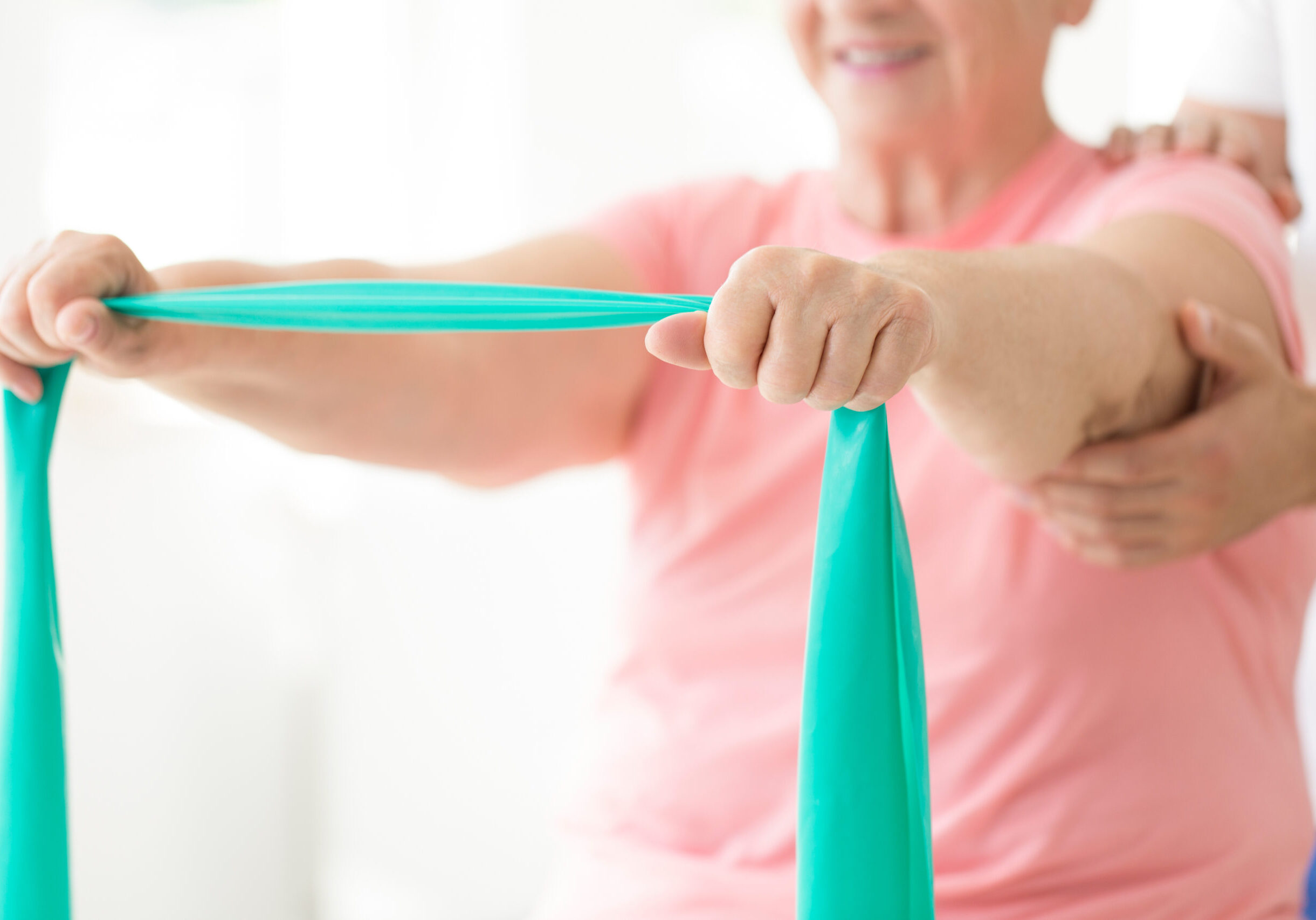 Close-up,Of,Hands,Holding,An,Elastic,,Resistance,Band