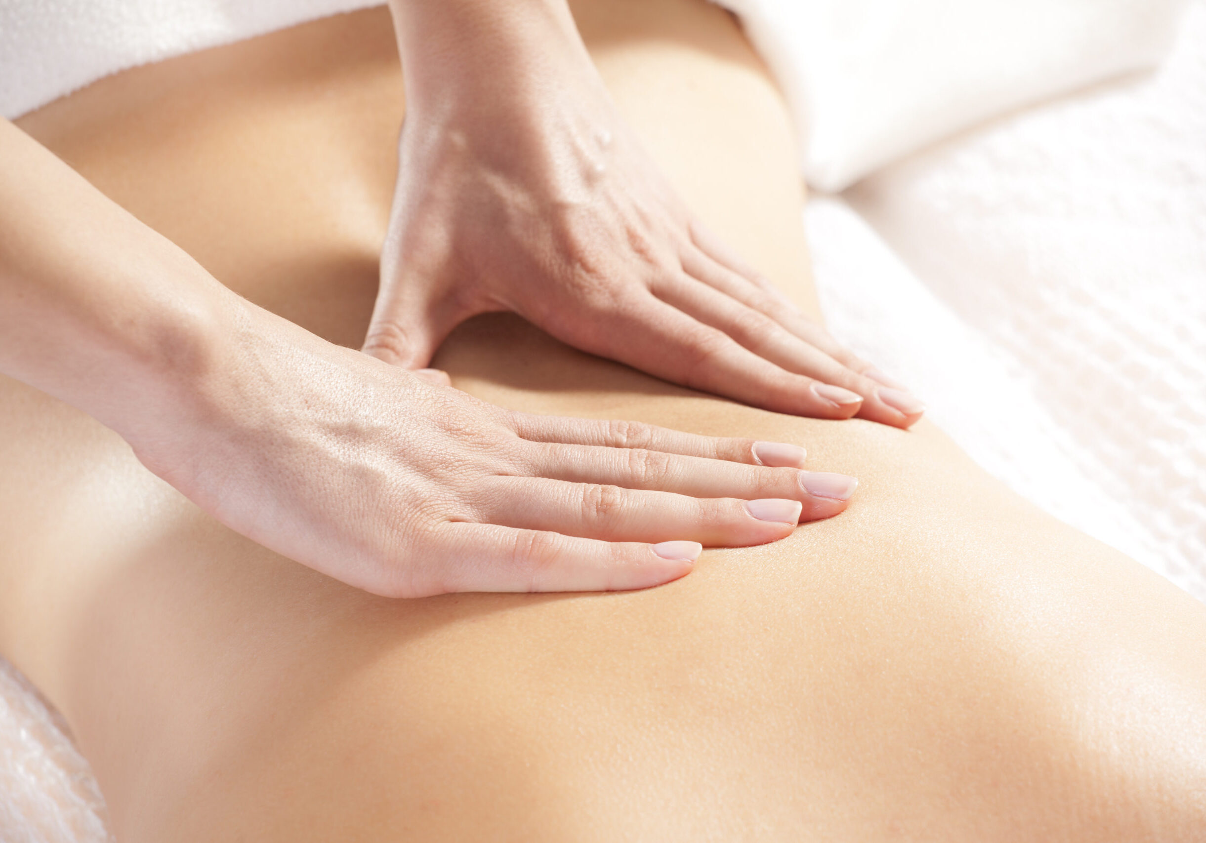 Woman,Giving,Back,Massage,To,A,Girl