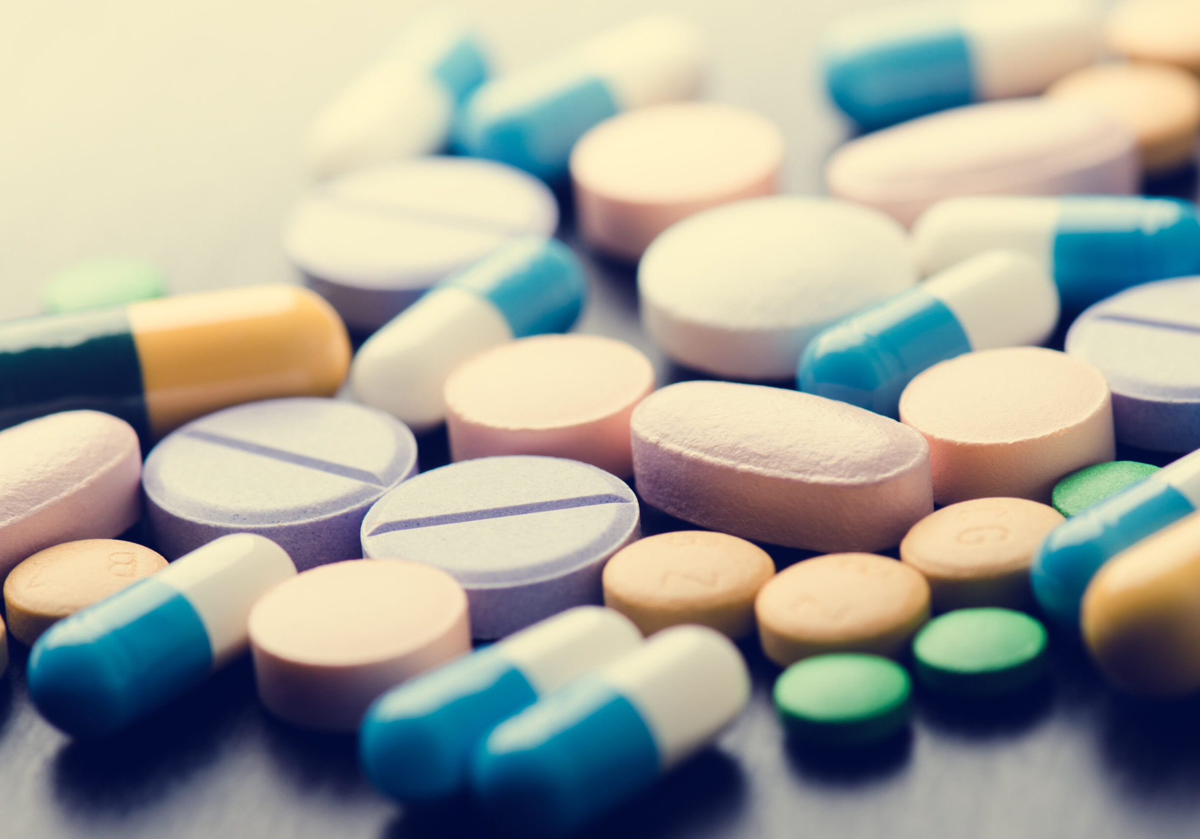 Pharmacy,Background,On,A,Black,Table.,Tablets,On,A,Black